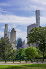 Fototapeta na wymiar Summer daytime view on sky scrappers from Central Park New York with no people