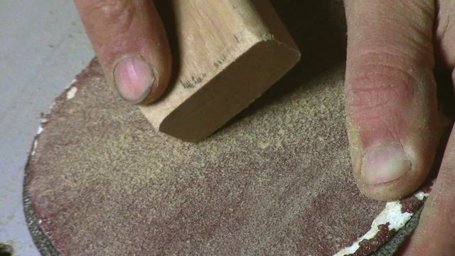In carpentry stodio workplace. Wood processing woodworking close-up. Process of creating  handmade wooden product.