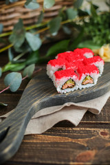 sushi with salmon and avocado. Sushi roll with salmon and tempura shrimp