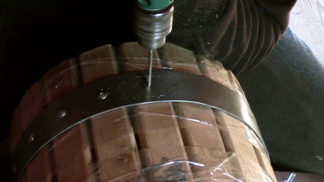 In carpentry stodio workplace. Wood processing woodworking close-up. Process of creating  handmade wooden product.