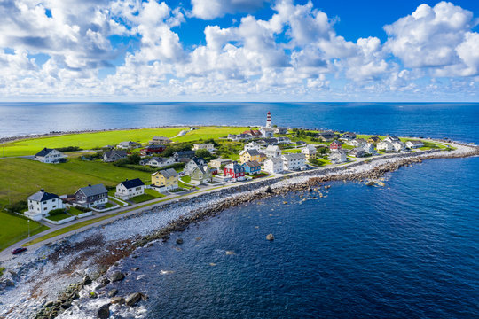 Aerial view by drone of the coastal village of Alnes, Godoya Island, Alesund, More og Romsdal County