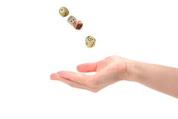 Woman throws dices isolated on white.