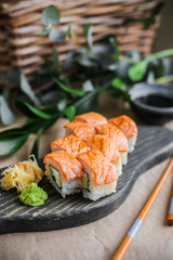 sushi with salmon and avocado. Sushi roll with salmon and tempura shrimp