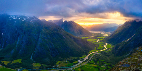 Aerial view of clouds at sunset over Romsdalen valley from Romsdalseggen ridge, Andalsnes, More og Romsdal county