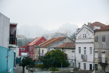 City in the morning fog