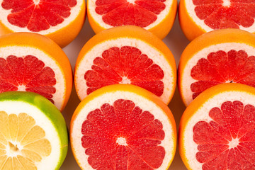 Pomelo and grapefruit slices background.