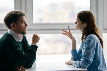 man and woman shaking hands