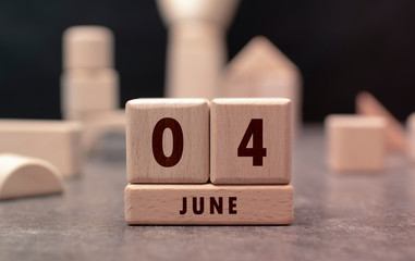 June 4 written with wooden blocks