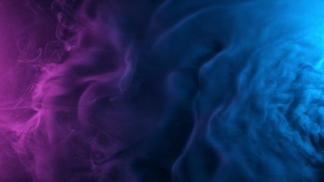 Slow motion of coloured smoke effect with neon lights. Filmed on high speed cinema camera 