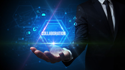 Man hand holding COLLABORATION inscription, social media concept