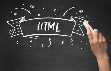 Hand drawing HTML abbreviation with white chalk on blackboard