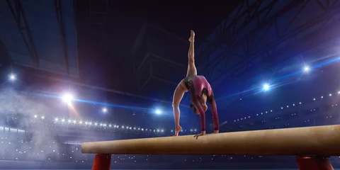Rolgordijnen Female gymnast on professional arena. © Victoria VIAR PRO