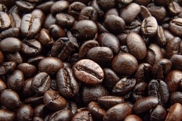 roasted coffee beans background / coffee beans texture / close up