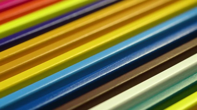 many wooden color pencils stacked 