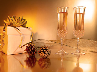 Champagne with present and pine cones