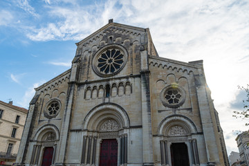 Fototapeta premium St Paul Church Gothic church with one spire and rose window in Nimes. Gard, Provence, France, Europe
