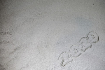 Artwork decoration. Happy new 2020 year. Empty space for your text. 2020 written on the snow