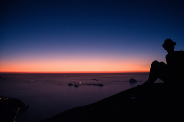 Sunrise at the top of Pedra da G&aacute;vea with panoramic views of the city of Rio de Janeiro. Brazil