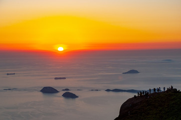 Obraz premium Sunrise at the top of Pedra da Gávea with panoramic views of the city of Rio de Janeiro. Brazil