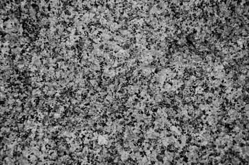 Granite background. The wall of the old building. Close-up.