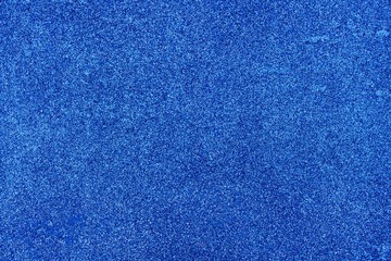 Abstract blue background with sequins texture. Holiday concept. Color of year 2020.
