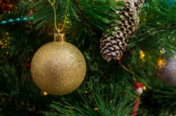 Fir cones as a toy on a Christmas tree. Close up.