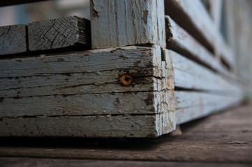 Wooden gate of an old ruined wooden house