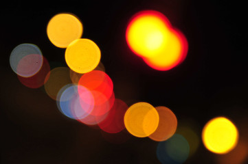Blur city traffic light bokeh abstract background at night 