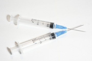 medical syringes on a white background