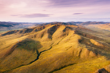 Aerial view of Buryatia mountain landscape at sunset. Natural scenery near Khoshun-Uzur, Siberia, Russia