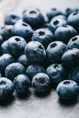 Fresh blueberry background. Texture blueberry berries close up. Vegan and vegetarian concept.