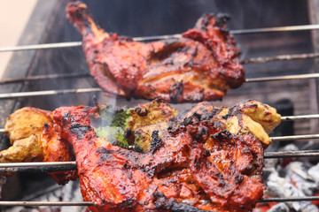 Selected Focus on Grilled Chicken Breast Non Veg Barbeque BBQ Roasted on Smoking Hot Charcoal