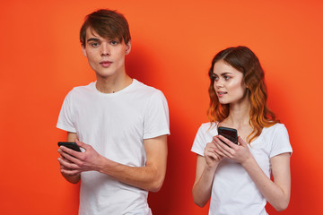 man and woman in t-shirts