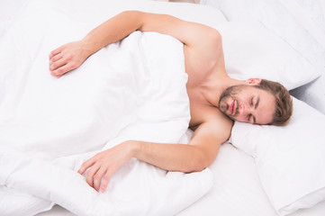 Fototapeta na wymiar Enough amount sleep every night. Tips sleep better. Bearded man relaxing on pillow. Soft pillow. Health care concept. Circadian rhythm regulates sleep wake cycle. Man handsome unshaven guy in bed