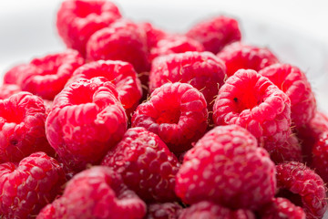 Fresh and sweet raspberries background