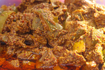 Spicy Hot Tangy Green Mango Ginger Garlic Pickles Soaked in Cooking Oil Indian Aam Ka Aachar