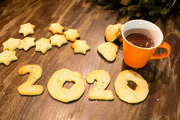 home made biscuits, form 2020, on a brown wood table 