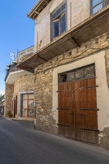 Fototapeta na wymiar old wooden windows and doors in Lefkara village, cyprus
