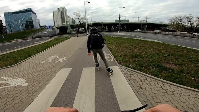 POV  Time Lapse Man On Electric Scooter Following Inline Skater