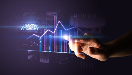 Hand touching SHARING ECONOMY button, business concept