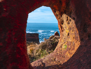 A hole in the geoforms of Labetxu on Mount Jaizkibel. Basque Country