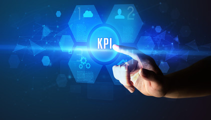 Hand touching KPI inscription, new technology concept