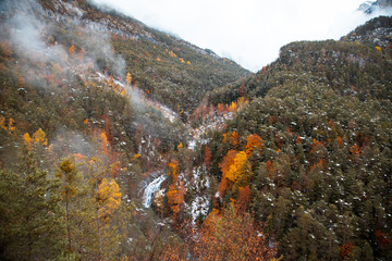 Ordesa National Valley in snowy autumn, located in Pyrenees Spain