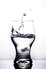 Glass with water isolated on a white background