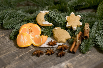 mandarin tree blue spruce background cinnamon star anise christmas present new year cookies gingerbread mulled wine