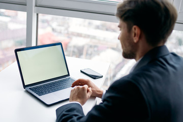 businessman working on tablet computer in office