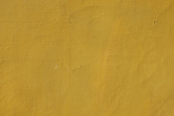 texture rough plastered wall yellow