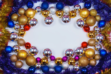 Gold, blue, red and silver glitter Christmas balls pattern. Flat lay, top view, copy space.  New year creative arrangement frame.