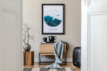 Modern scandinavian living room interior with mock up poster frame, design commode, flower in vase,...