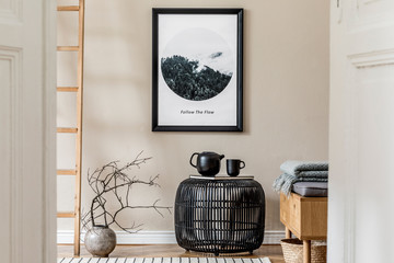 Interior design of living room with stylish rattan pouf, wooden commode, ladder , tea pot, mock up...
